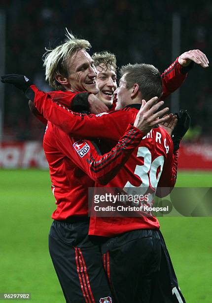 Sami Hyypiae of Leverkusen celebrates the third goal with Stefan Kiessling and Toni Kroos during the Bundesliga match between Bayer Leverkusen and SC...