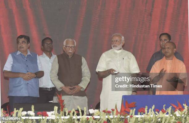 Prime Minister Narendra Modi with UP Governor Ram Naik, Union Minister of Road Transport and Highways Nitin Gadkari, Uttar Pradesh Chief Minister...