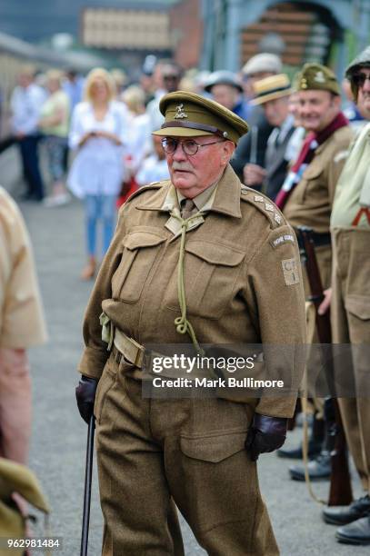 Re-enactors as the cast of the hit TV Series Dad's Army salute a train stopping at the platform on May 27, 2018 in Weybourne, England. The North...