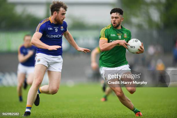 Longford , Ireland - 27 May 2018; Ben Brennan of Meath in action against Conor Berry of Longford during the Leinster GAA Football Senior Championship...
