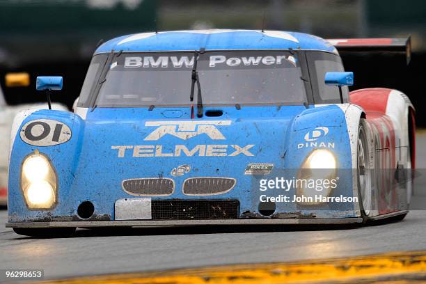 The TELEMEX/Target BMW Riley, driven by drivers Scott Pruett, Memo Rojas, Justin Wilson & Max Papis leads a group of cars into the East Horshoe...