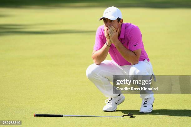 Rory McIlroy of Northern Ireland reacts to a missed eagle putt on the 18th green during the final round of the BMW PGA Championship at Wentworth on...