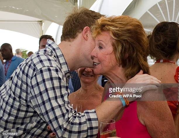 Prince Harry meets Cilla Black before playing in the inaugural Setebale Polo Cup at the Apes Hill polo club on January 31, 2010 in Apes Hill,...