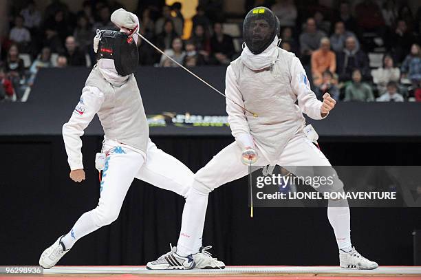 Russia's Alexey Cheremisinov fights against Italy's Andrea Baldini during the Men's International Paris' Challenge Epee competition, on January 31,...