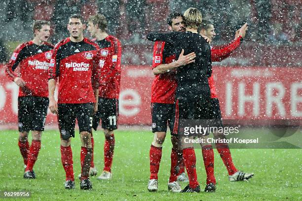 Manuel Friedrich of Leverkusen embraces Sami Hyypiae after winning 3- the Bundesliga match between Bayer Leverkusen and SC Freiburg at the BayArena...