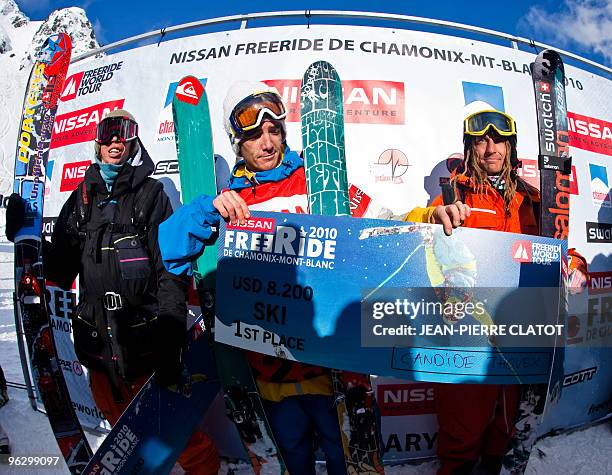 Tim Dutton, French Candide Thovex and Swedish Kaj Zackrisson pose on the podium at the end of the French stage of the Freeride World Tour on January...