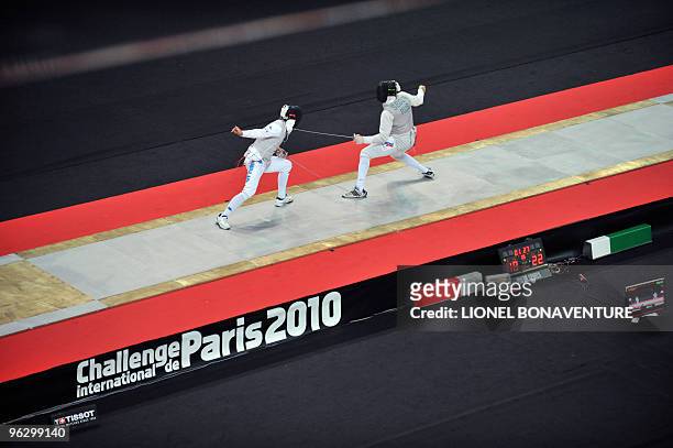 Russian Artem Sedov competes with Italy's Andrea Badini during the Men's International Paris' Challenge Epee competition, on January 31, 2010. Team...
