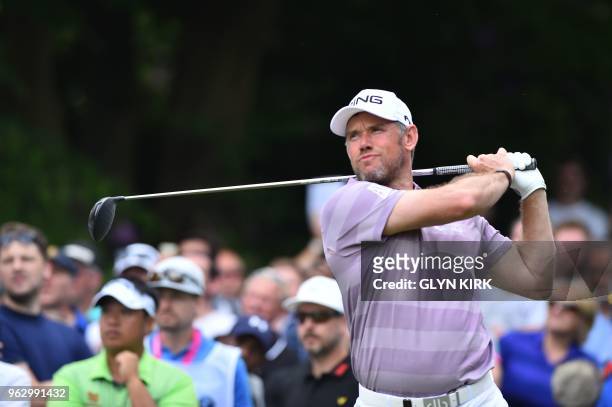 England's Lee Westwood tees off the seventeenth hole on day four of the golf PGA Championship at Wentworth Golf Club in Surrey, south west of London,...