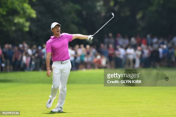 Northern Ireland's Rory McIlroy plays his second shot on the seventeenth hole on day four of the golf PGA Championship at Wentworth Golf Club in...