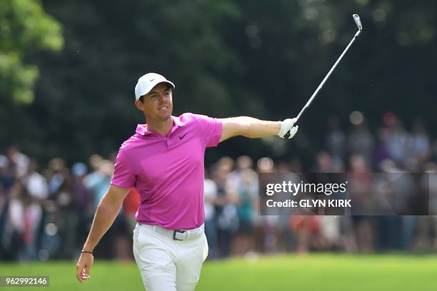 Northern Ireland's Rory McIlroy plays his second shot on the seventeenth hole on day four of the golf PGA Championship at Wentworth Golf Club in...