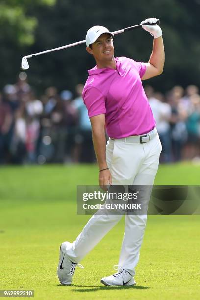 Northern Ireland's Rory McIlroy plays his second shot on the seventeenth hole on day four of the golf PGA Championship at Wentworth Golf Club in...