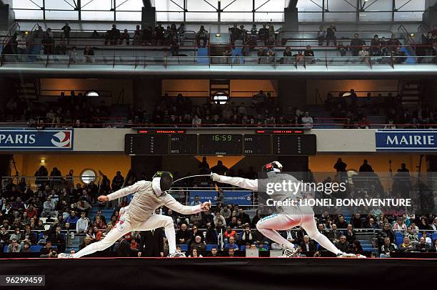 Russia's Renal Ganeev competes with Italia's Andrea Cassera during the Men's International Paris' Challenge Epee competition, on January 31, 2010....