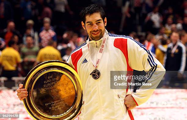 Nikola Karabatic of France poses with the trophy after winning the Men's Handball European final match between France and Croatia at the Stadthalle...