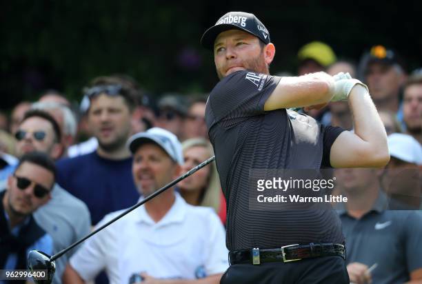 Branden Grace of South Africa tees off during day four and the final round of the BMW PGA Championship at Wentworth on May 27, 2018 in Virginia...