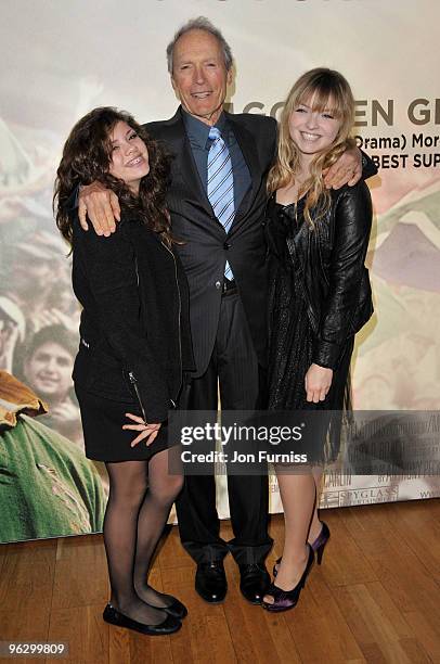 Director Clint Eastwood with his daughters Morgan and Francesca attend the "Invictus" film premiere at the Odeon West End on January 31, 2010 in...