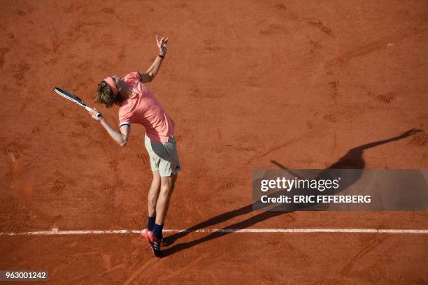Germany's Alexander Zverev serves the ball to Lithuania's Ricardas Berankis during their men's singles first round match on day one of The Roland...