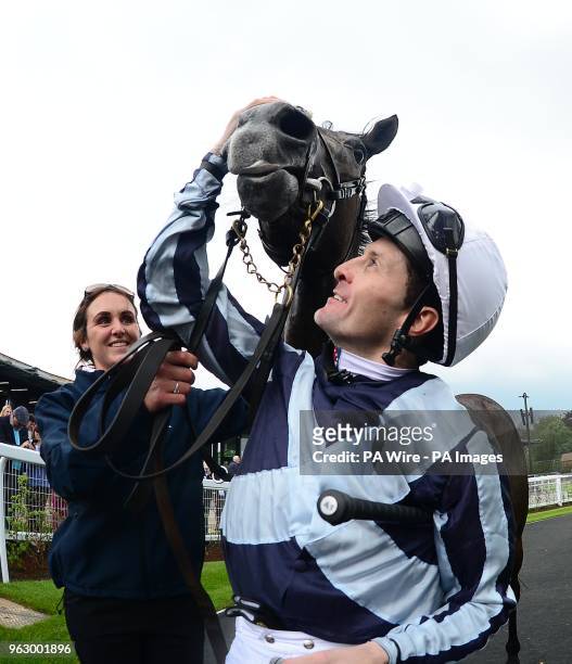 Jockey Colm O'Donoghue and groom Debbie Flavin with Alpha Centauri after their win Tattersalls 1000 Guineas during day two of the 2018 Tattersalls...