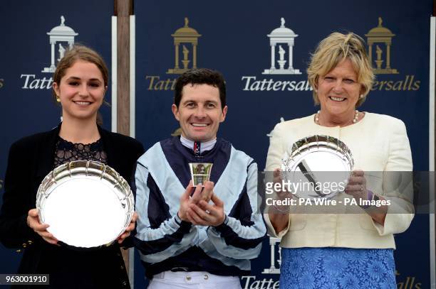Trainer Jessica Harrington, jockey Colm O'Donoghue and owner Electra Niarchos pose with their trophies after Alpha Centauri won the Tattersalls 1000...