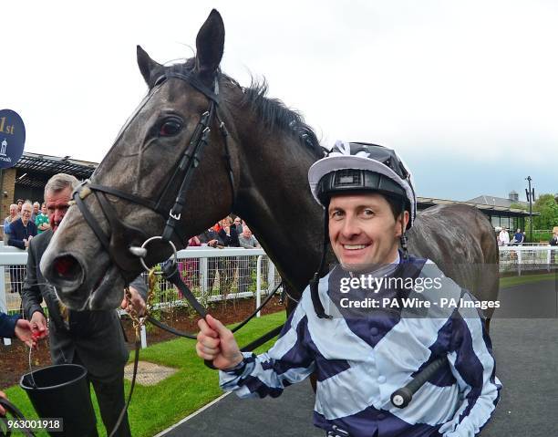 Jockey Colm O'Donoghue with Alpha Centauri after their win Tattersalls 1000 Guineas during day two of the 2018 Tattersalls Irish Guineas Festival at...