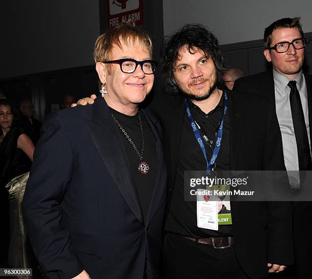 Elton John and Jeff Tweedy of Wilco backstage at 2010 MusiCares Person Of The Year Tribute To Neil Young at the Los Angeles Convention Center on...