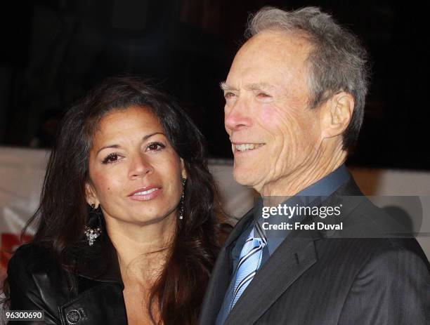 Clint Eastwood and wife Dina Ruiz attends the UK Film Premiere of 'Invictus' at Odeon West End on January 31, 2010 in London, England.