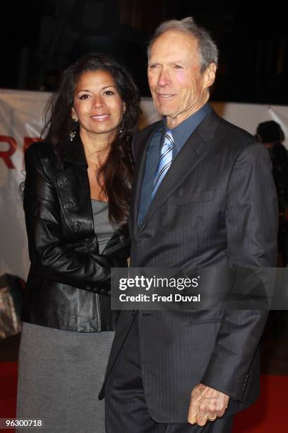 Clint Eastwood and wife Dina Ruiz attends the UK Film Premiere of 'Invictus' at Odeon West End on January 31, 2010 in London, England.