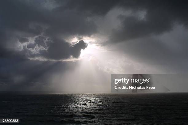 dark skies - every cloud has a silver lining stock pictures, royalty-free photos & images