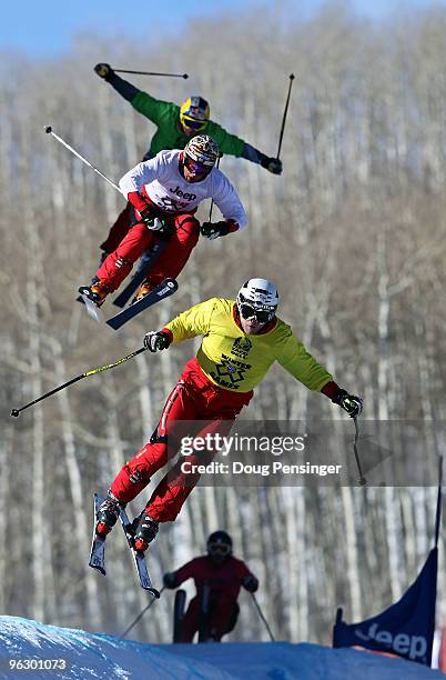 Brady Leman of Canada takes the lead ahead of Davey Barr of Canada and Daron Rahlves of the USA in their quarterfinal heat of Men's Skier X at Winter...