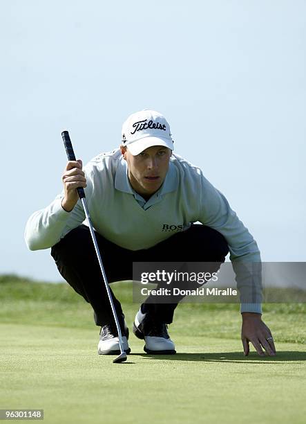 Ben Crane lines up a putt on the fourth hole during the final round of the 2010 Farmers Insurance Open on January 31, 2010 at Torrey Pines Golf...