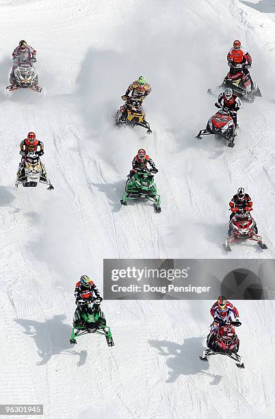 Competitiors go head to head in the Snowmobile SnoCross finals at Winter X Games 14 at Buttermilk Mountain on January 31, 2010 in Aspen, Colorado.