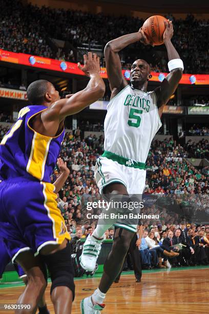 Kevin Garnett of the Boston Celtics rises up for a shot against Andrew Bynum of the Los Angeles Lakers on January 31, 2010 at the TD Garden in...