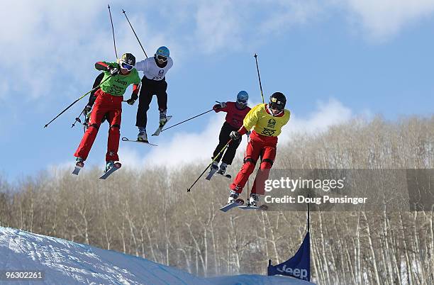 Ashleigh McIvor of Canada and Kelsey Serwa of Canada lead their quarterfinal heat over Caitlin Ciccone of the USA, Marte Gjefsen of Norway and Gro...