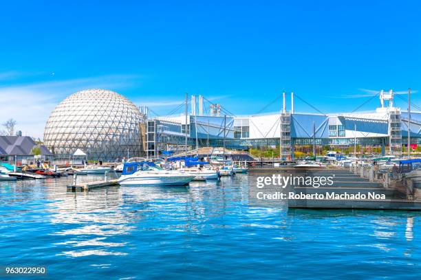 toronto canada: the marina inside ontario place featuring the exterior of the cinesphere. - toronto waterfront stock pictures, royalty-free photos & images