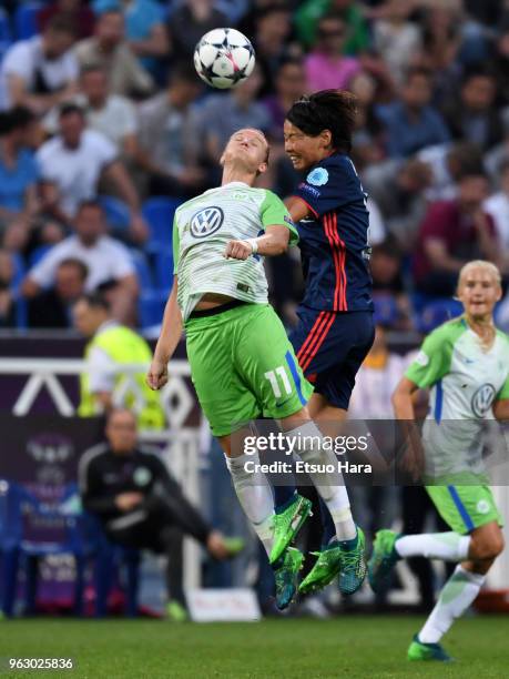 Alexandra Popp of Wolfsburg and Saki Kumagai of Olympique Lyonnais compete for the ball during the UEFA Womens Champions League Final between VfL...