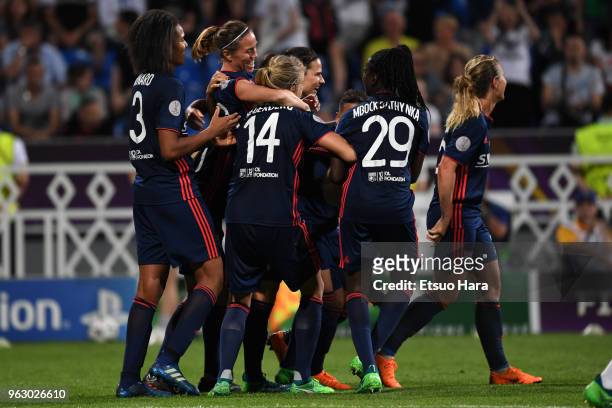 Camille Abily of Olympique Lyonnais celebrates scoring her side's fourth goal with her team mates during the UEFA Womens Champions League Final...