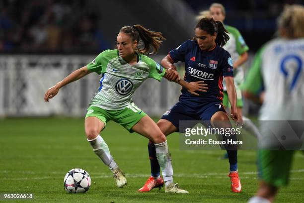 Tessa Wullaert of Wolfsburg controls the ball under pressure of Amel Majri of Olympique Lyonnais during the UEFA Womens Champions League Final...