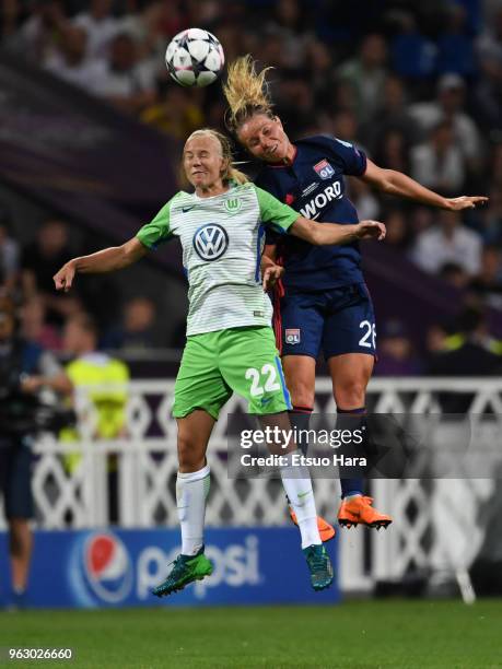 Pernille Harder of Wolfsburg and Amandine Henry of Olympique Lyonnais compete for the ball during the UEFA Womens Champions League Final between VfL...