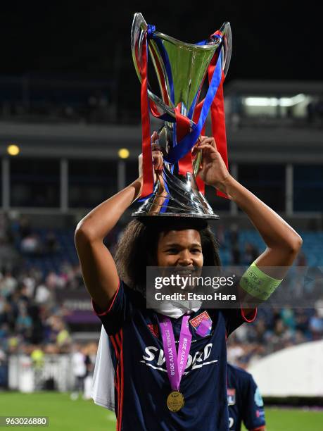 Wendie Renard of Olympique Lyonnais celebrates with the trophy after the UEFA Womens Champions League Final between VfL Wolfsburg and Olympique...