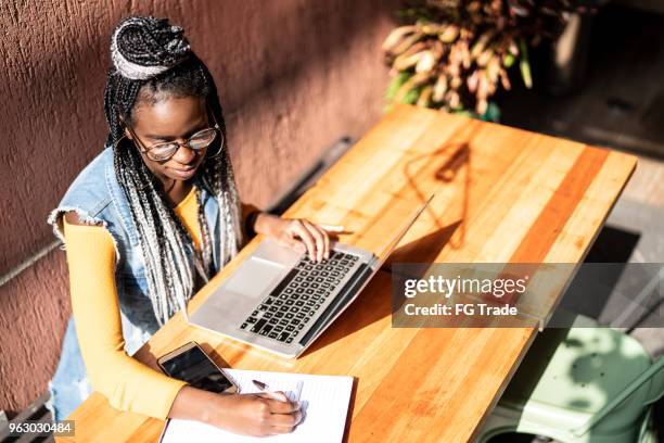 business woman working distance with laptop - teen entrepreneur stock pictures, royalty-free photos & images