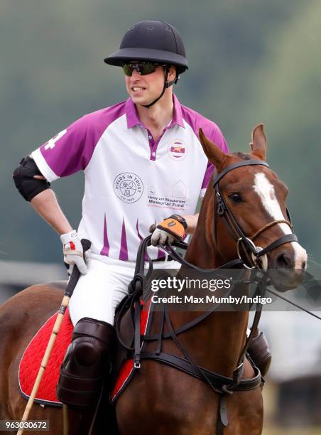 Prince William, Duke of Cambridge plays in the Jerudong Trophy charity polo match at Cirencester Park Polo Club on May 25, 2018 in Cirencester,...