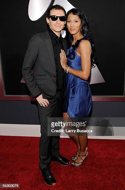 Musician Chester Bennington and wife Talinda Bentley of the band Linkin Park arrive at the 52nd Annual GRAMMY Awards held at Staples Center on...