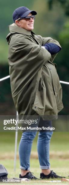 Zara Tindall watches her cousin Prince William, Duke of Cambridge play in the Jerudong Trophy charity polo match at Cirencester Park Polo Club on May...