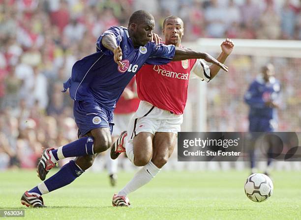 Ade Akinbiyi of Leicester City takes on Ashley Cole of Arsenal during the FA Barclaycard Premiership match between Arsenal and Leicester City played...
