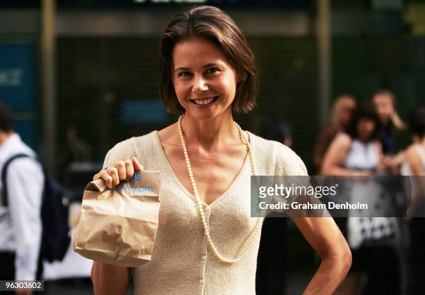 Antonia Kidman hands out free packed lunches to commuters to mark the start of ANZ bank's "FebuSave" initiative at Martin Place on February 1, 2010...