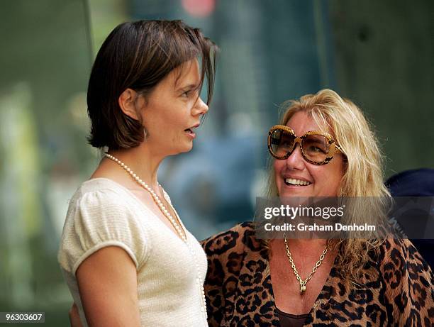 Antonia Kidman and fashion designer Charlie Brown attend an event to hand out free packed lunches to commuters to mark the start of ANZ bank's...