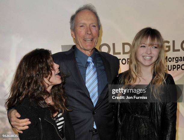 Director Clint Eastwood with his daughters Morgan and Francesca attend the "Invictus" film premiere at the Odeon West End on January 31, 2010 in...