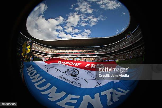 Fans of America show their support for the team?s striker Salvador Cabanas as they wait for the start of a Mexican championship Bicentenario 2010...
