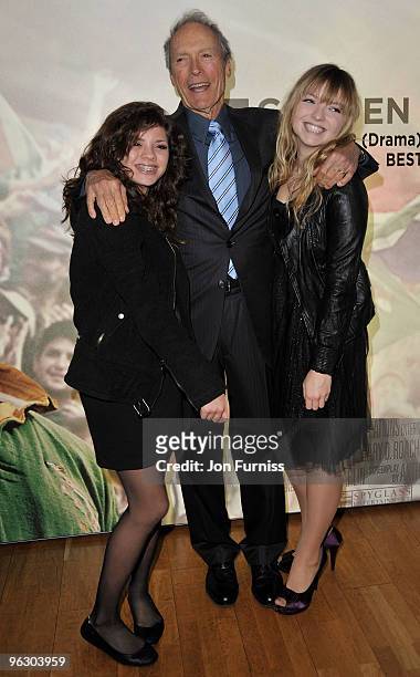 Director Clint Eastwood with his daughters Morgan and Francesca attend the "Invictus" film premiere at the Odeon West End on January 31, 2010 in...