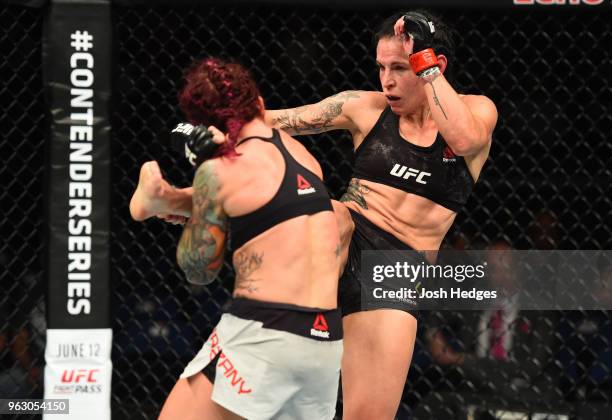 Lina Lansberg of Sweden kicks Gina Mazany in their women's bantamweight bout during the UFC Fight Night event at ECHO Arena on May 27, 2018 in...