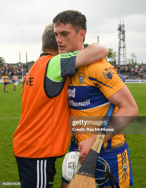 Clare , Ireland - 27 May 2018; Clare joint manager Donal Moloney is congratulated by the the Clare full back Conor Cleary after the Munster GAA...